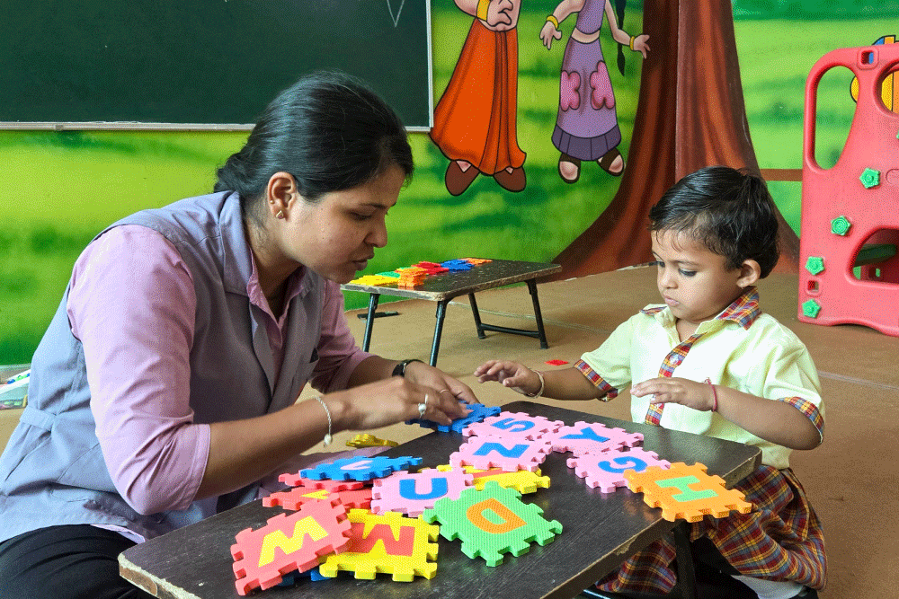 playgroup teacher teachig girl child
